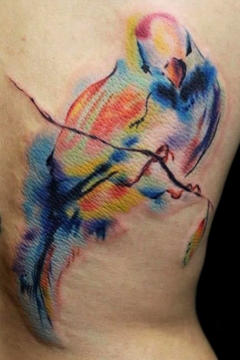 Tattoos de palomas al estilo acuarela