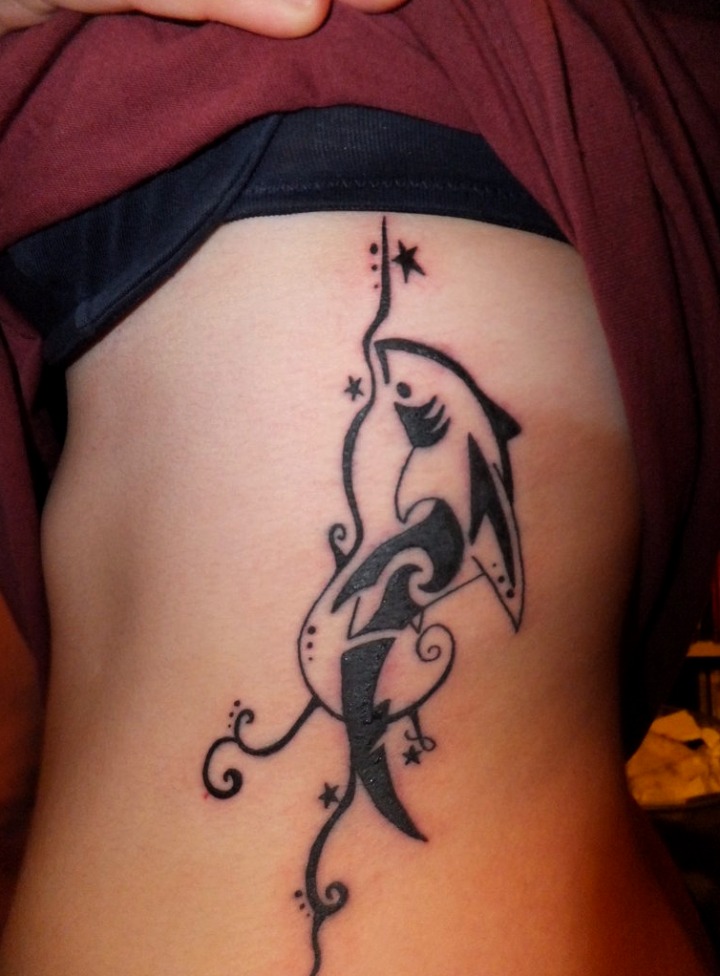 Tattoos de tiburones en mujeres