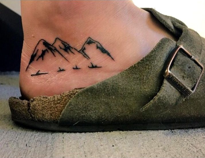 Tattoos en el pie para hombres