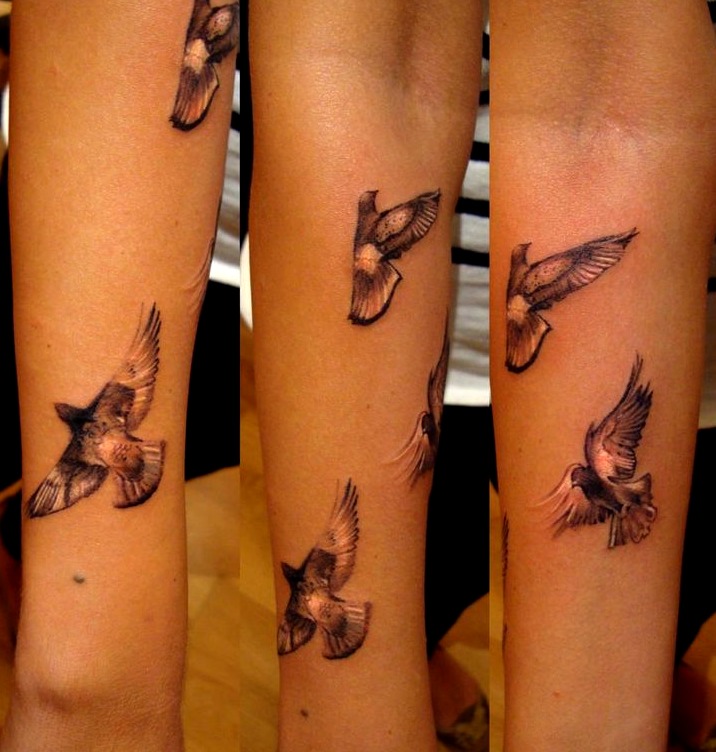 Tatuajes de palomas volando
