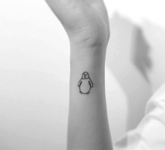 Tatuajes de pingüinos pequeños