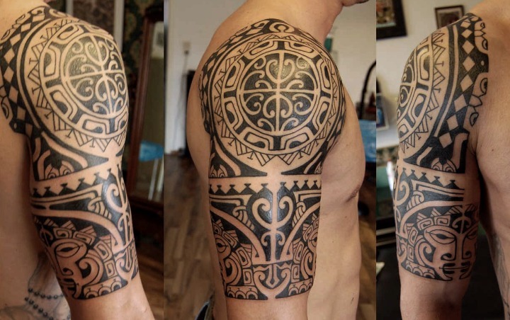 Tatuajes maoríes en el brazo